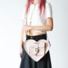 Bolso con forma de corazón Mochila de piel metalizada Bolso con forma de corazón Mochila de piel metalizada