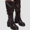 Botas altas de tacón de cuero Kasey Kinsley Botas altas de tacón de cuero Kasey Kinsley